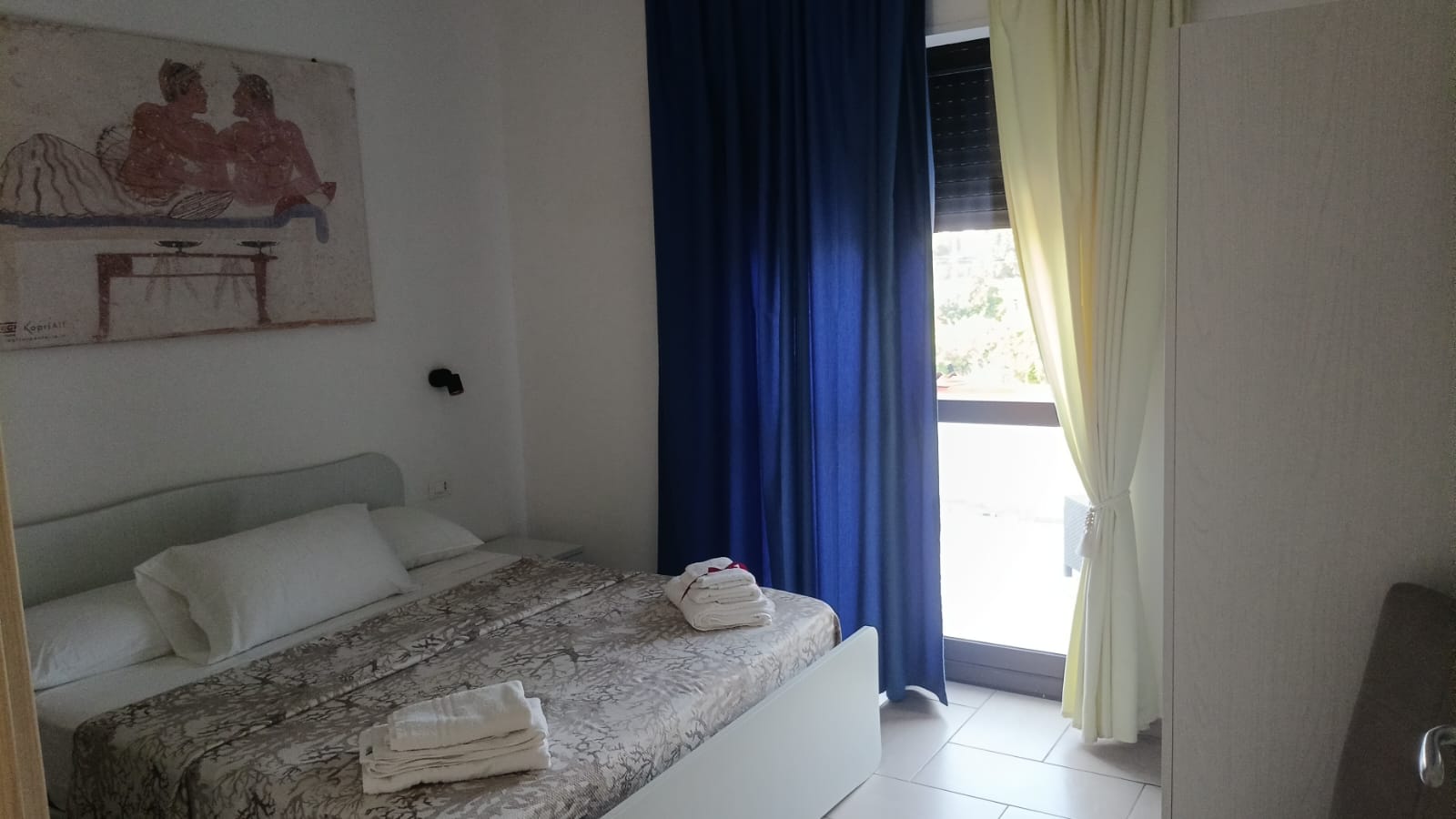 Ambiente di una camera di Prestige Affittacamere Paestum