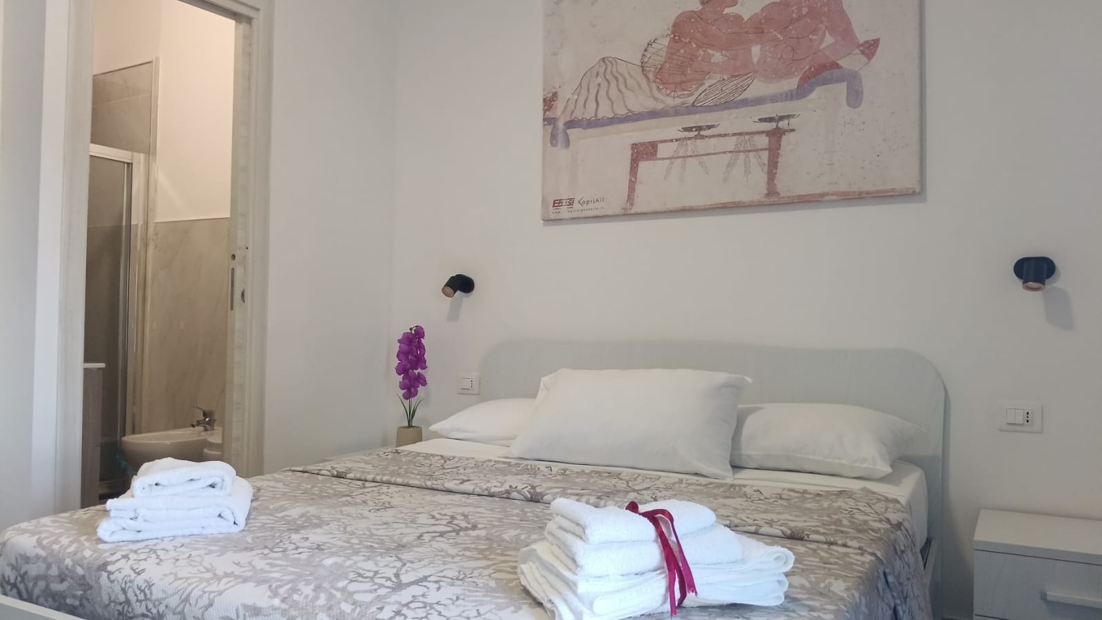 Ambiente di una camera di Prestige Affittacamere Paestum